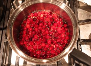 cranberries cooking in pot
