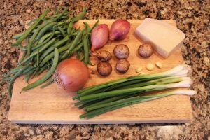 green bean casserole ingredients on butcher block