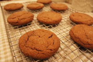 ginger molasses cookies on cooling rack