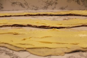cream spread on puff pastry