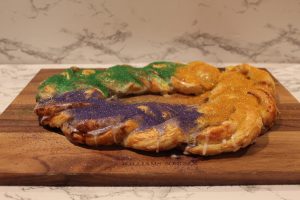 baked king cake with sprinkles