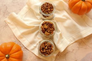 pumpkin granola in jar with yogurt